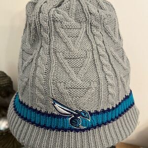 Charlotte Hornets NBA embroidered unisex acrylic beanie hat.